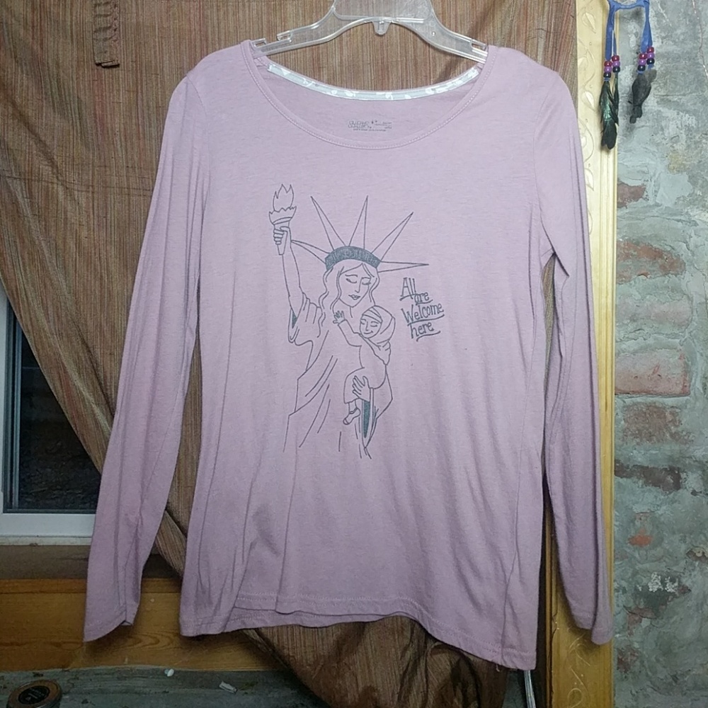 "All are welcome here" long sleeve t-shirt